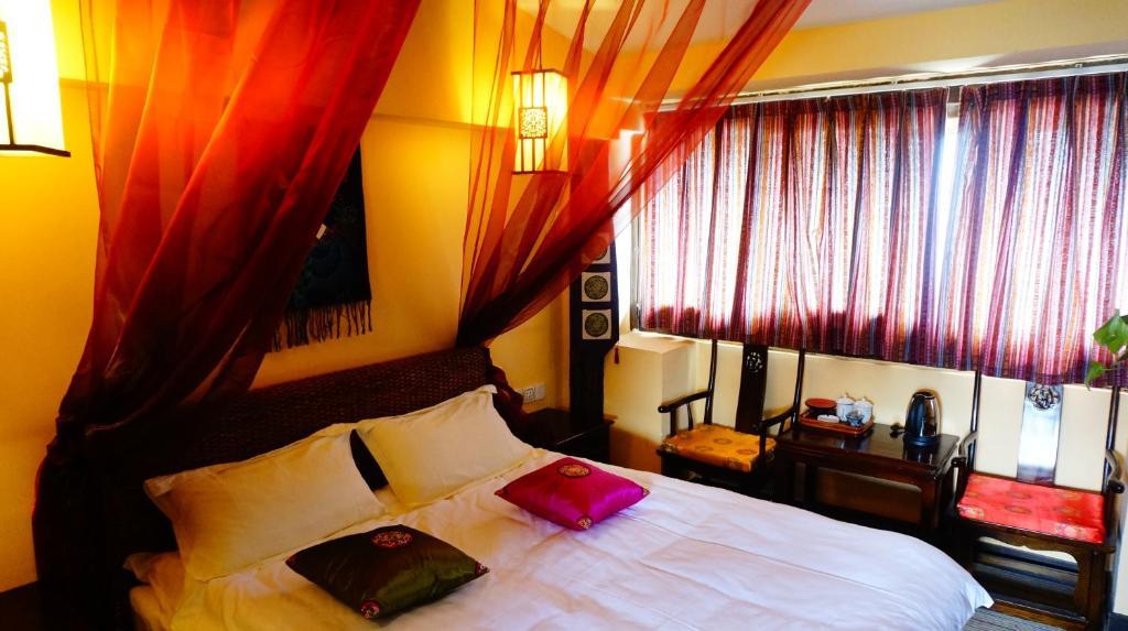 Lijiang Wangjia Courtyard Inn Номер фото