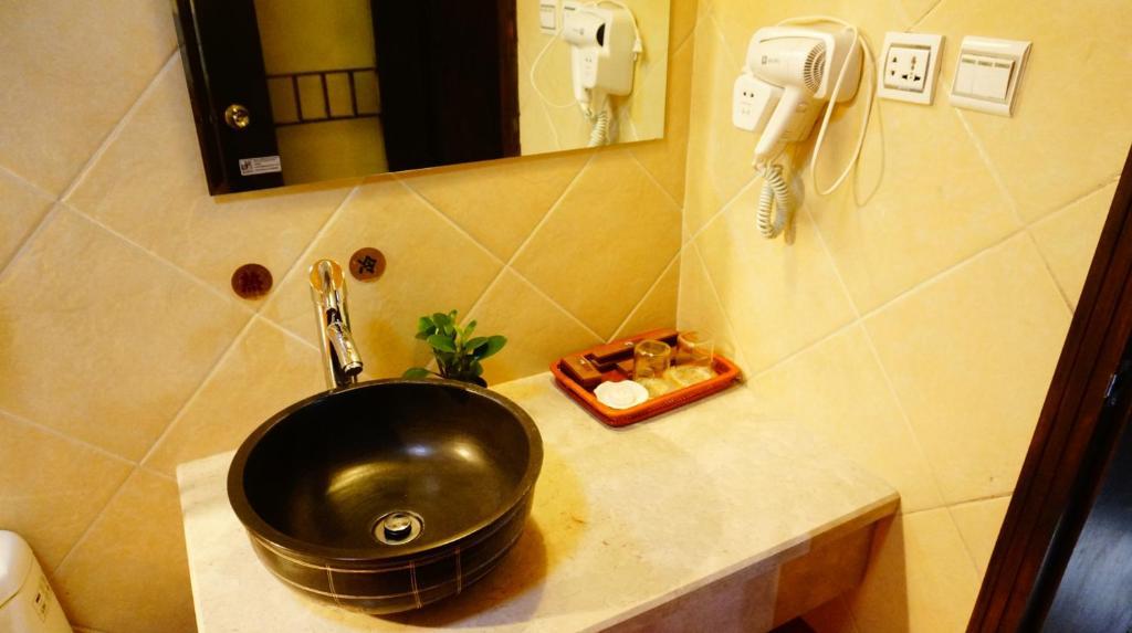 Lijiang Wangjia Courtyard Inn Номер фото